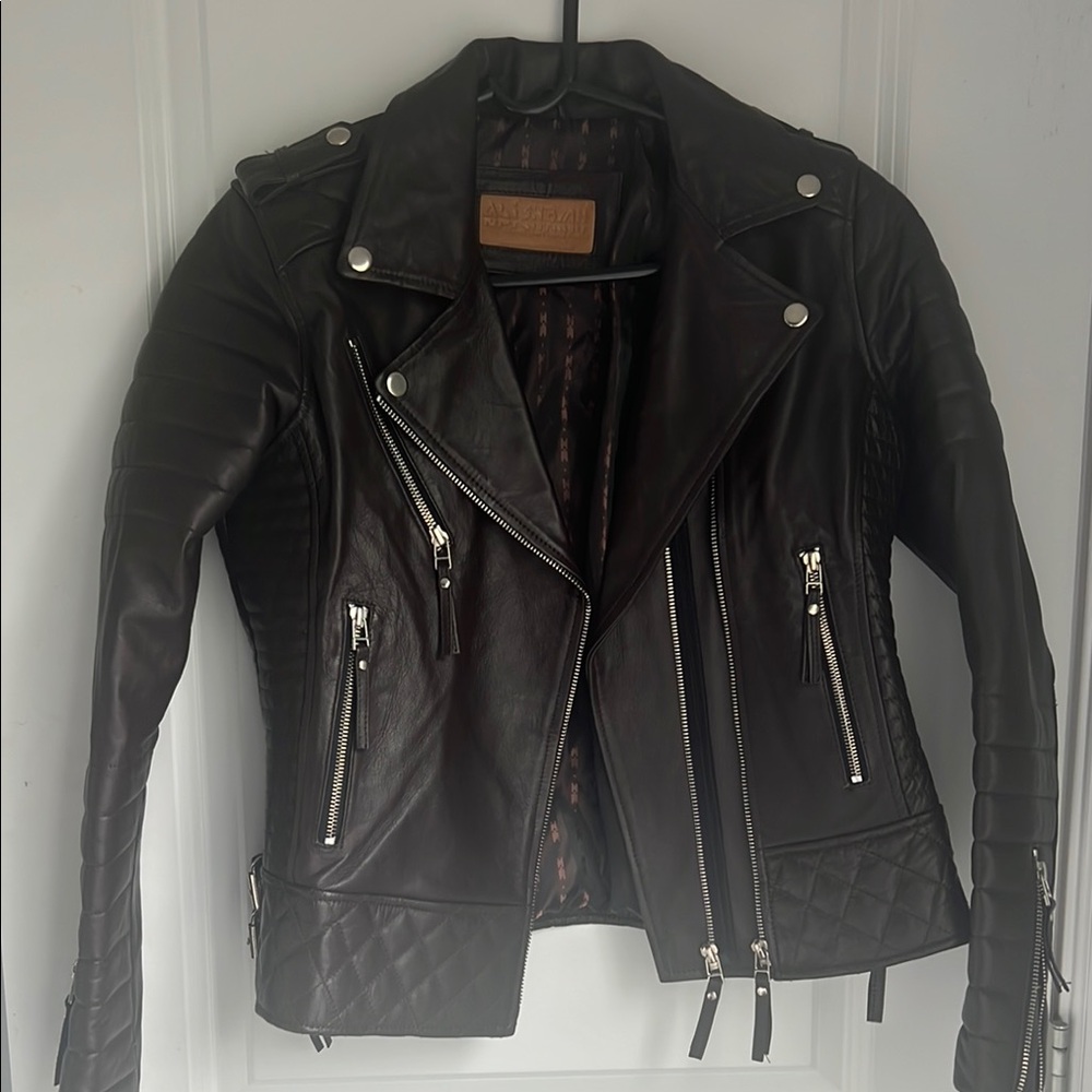 Black Leather Motorcycle Jacket with Quilted Shoulders never worn